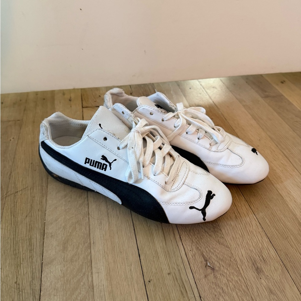 Puma women's White and Black Sneakers
